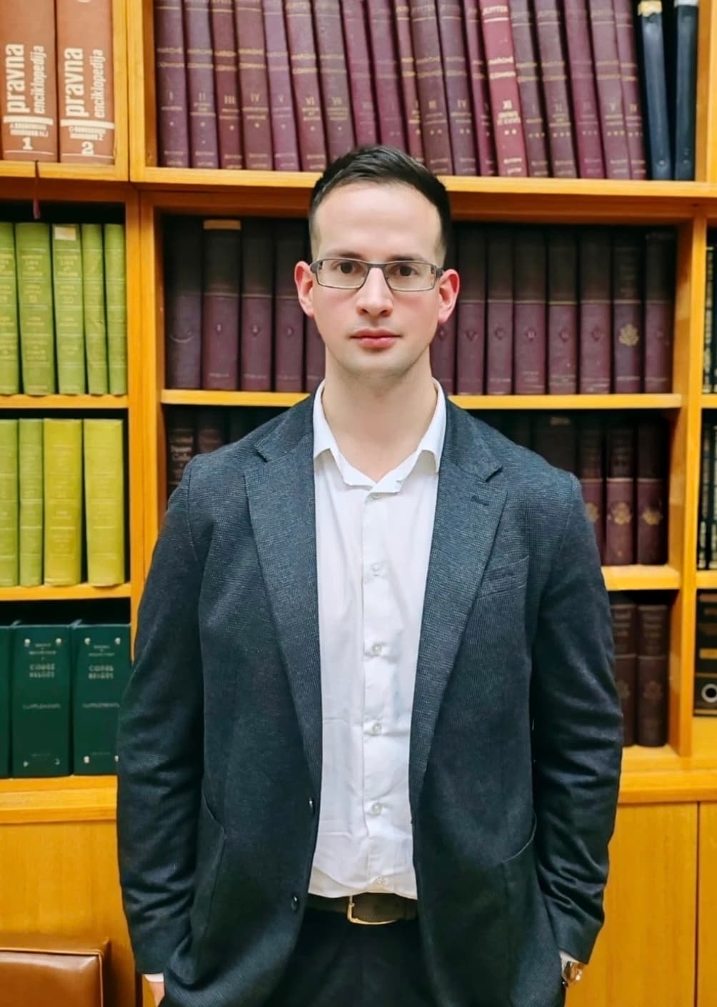 Janko Munjić in a law library